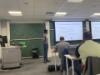 Researcher giving committee summary